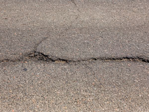 cracked asphalt surface